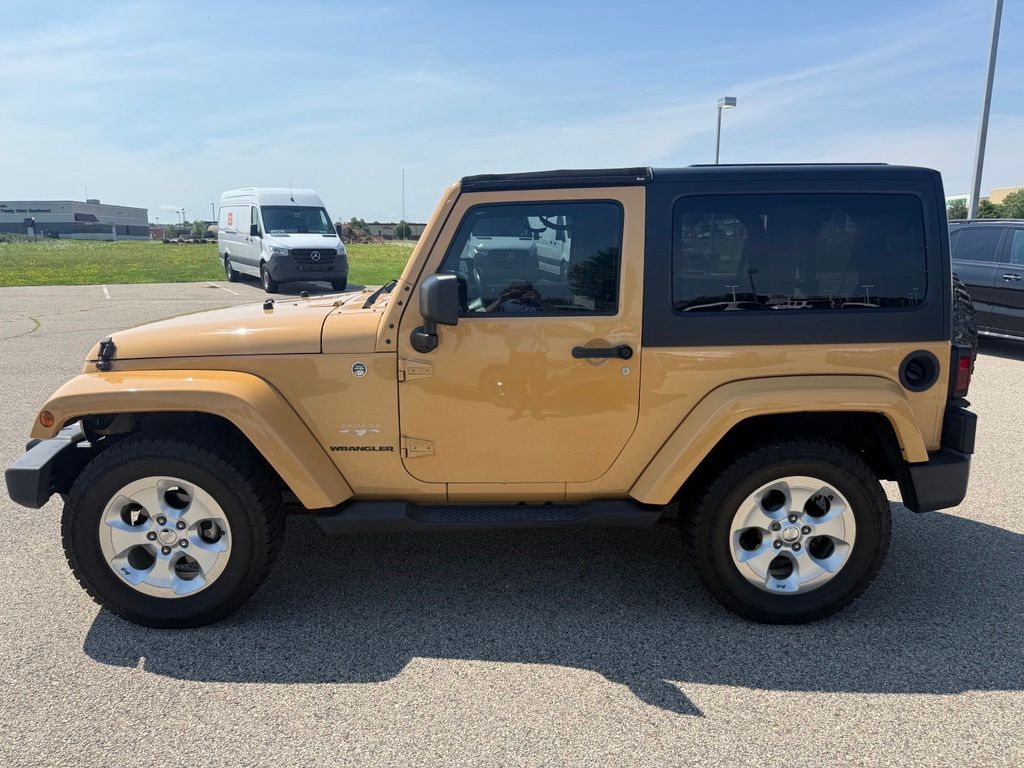 Used 2014 Jeep Wrangler Sahara with VIN 1C4AJWBG6EL236642 for sale in Rochester, Minnesota