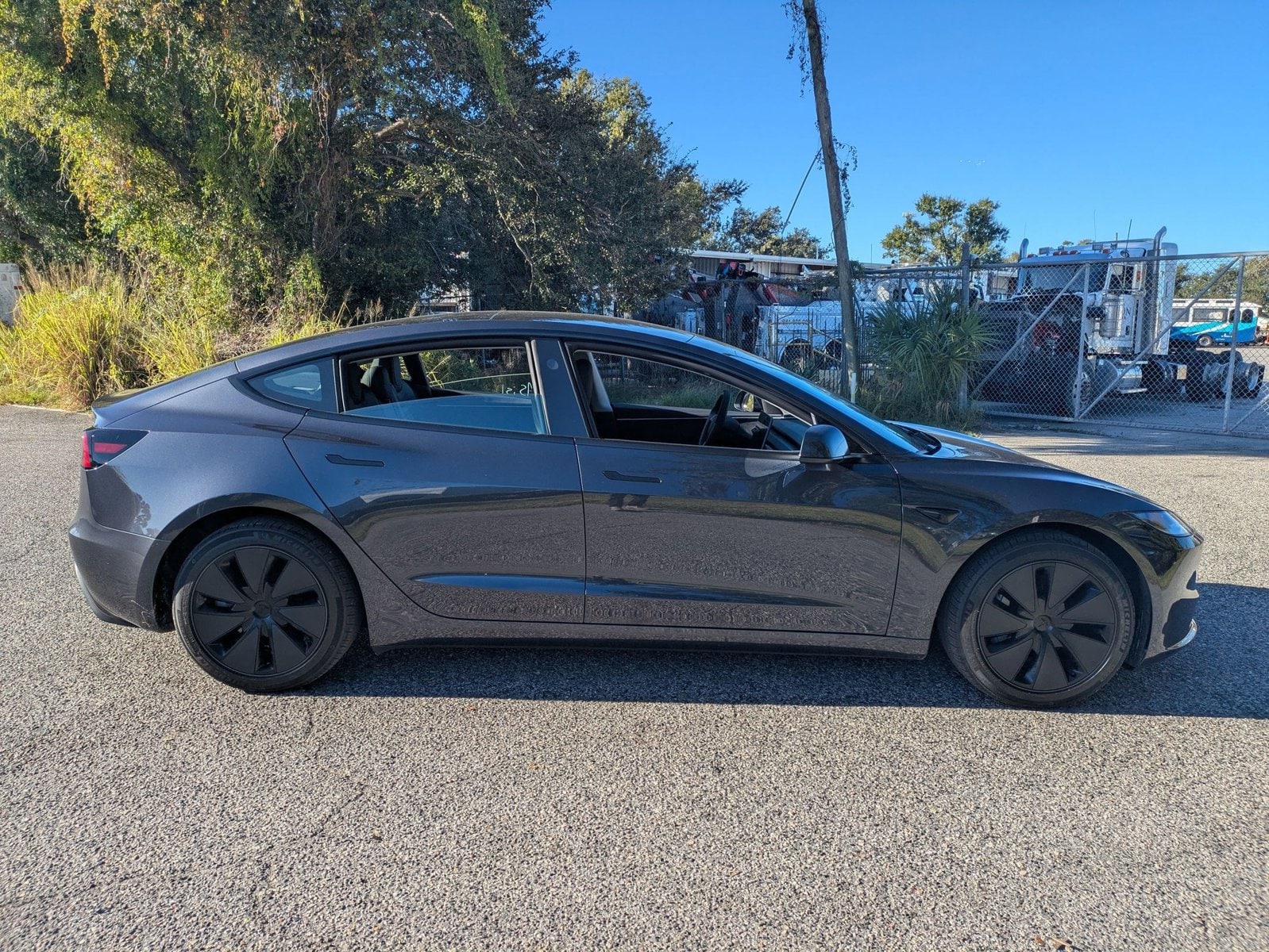 Used 2024 Tesla Model 3 Long Range with VIN 5YJ3E1EBXRF796124 for sale in Sarasota, FL