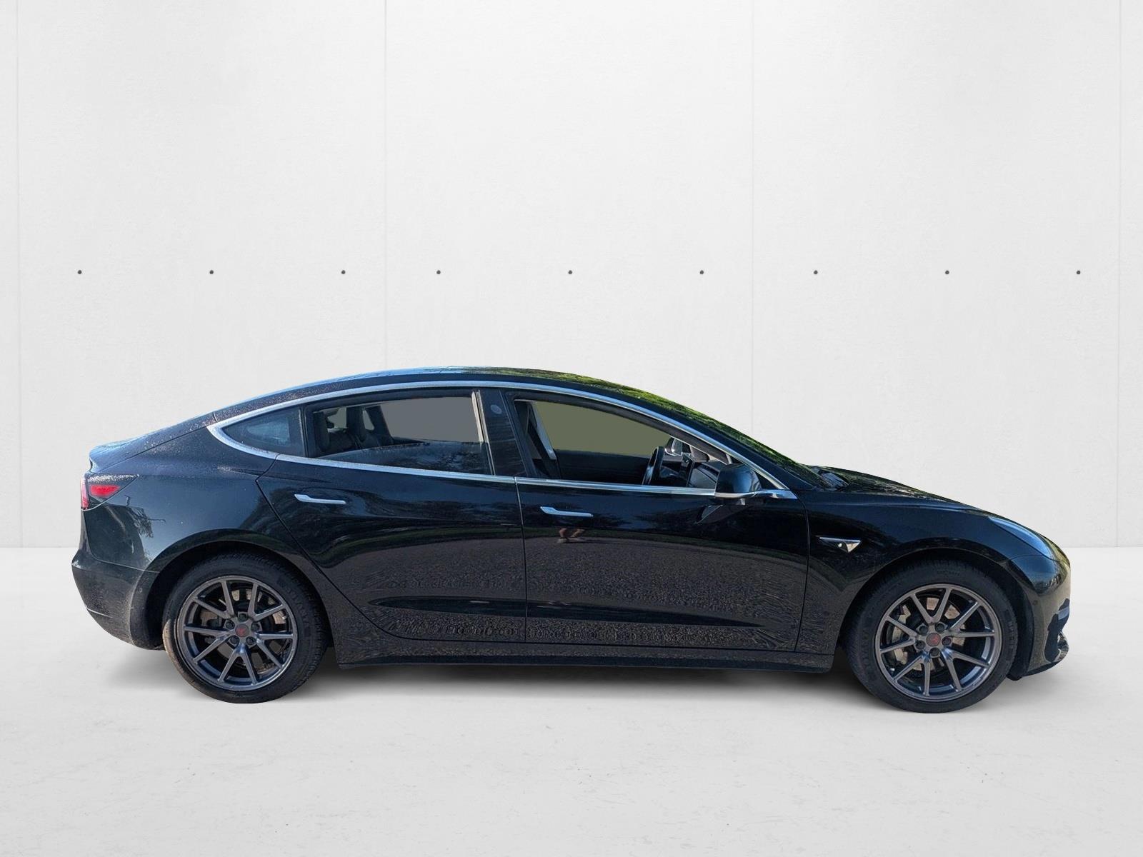Used 2019 Tesla Model 3 Mid Range with VIN 5YJ3E1EA2KF306594 for sale in Sarasota, FL