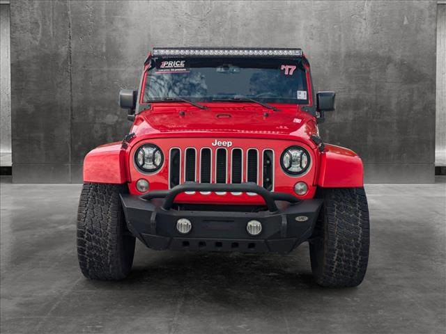 Used 2017 Jeep Wrangler Unlimited Sahara with VIN 1C4HJWEG3HL716085 for sale in Sarasota, FL