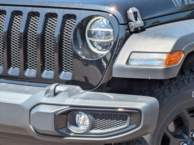 Used 2021 Jeep Wrangler Unlimited Willys with VIN 1C4HJXDG5MW700597 for sale in Sarasota, FL