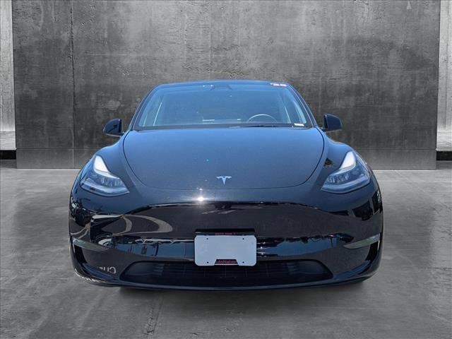 Used 2025 Tesla Model Y Long Range with VIN 7SAYGDEE4SF237821 for sale in Northfield, Minnesota