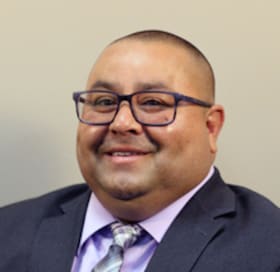 Staff member Raymond Aguirre from ID_496241a09b6c
