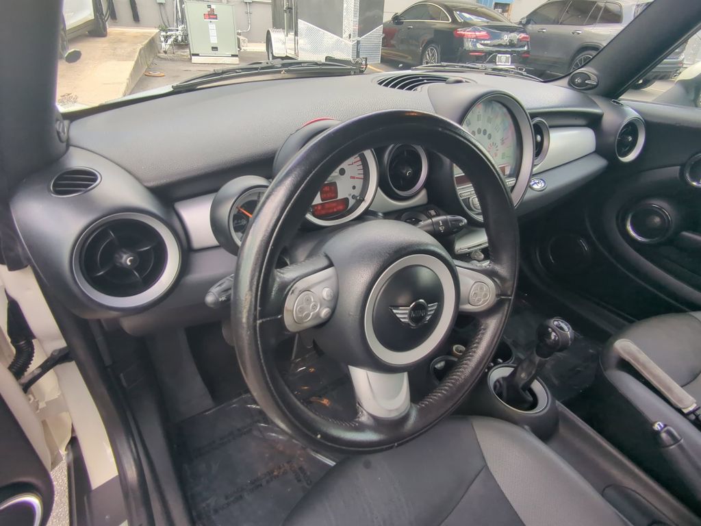 Used 2010 MINI Cooper Base with VIN WMWMR3C57ATZ18874 for sale in Orlando, FL