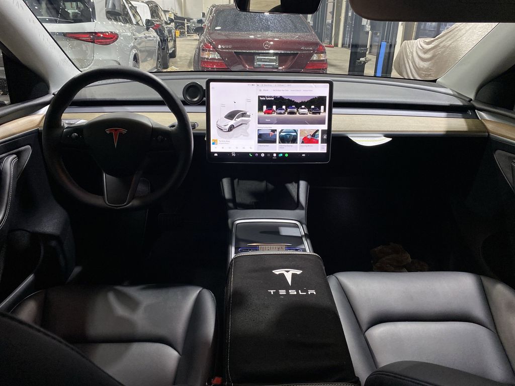 Used 2023 Tesla Model Y Long Range with VIN 7SAYGDEEXPA028300 for sale in Kansas City