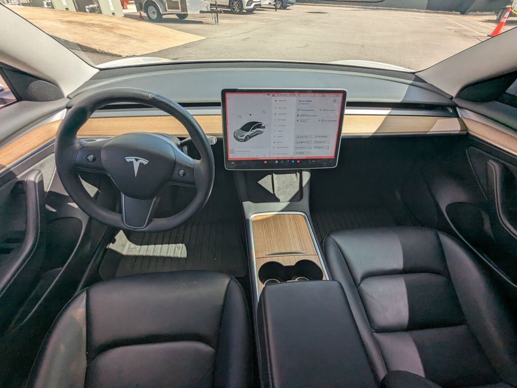 Used 2021 Tesla Model 3 Base with VIN 5YJ3E1EAXMF058128 for sale in Orlando, FL
