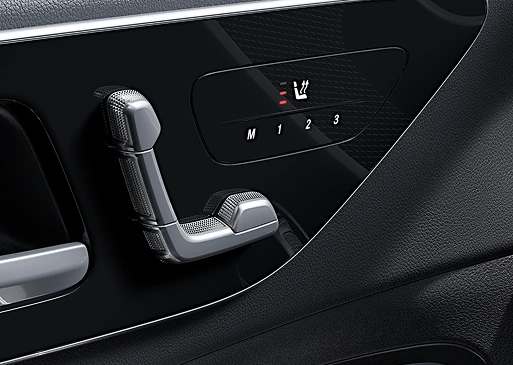 Seat-shaped power seat controls and memory buttons 1, 2 and 3 on a C-Class door panel