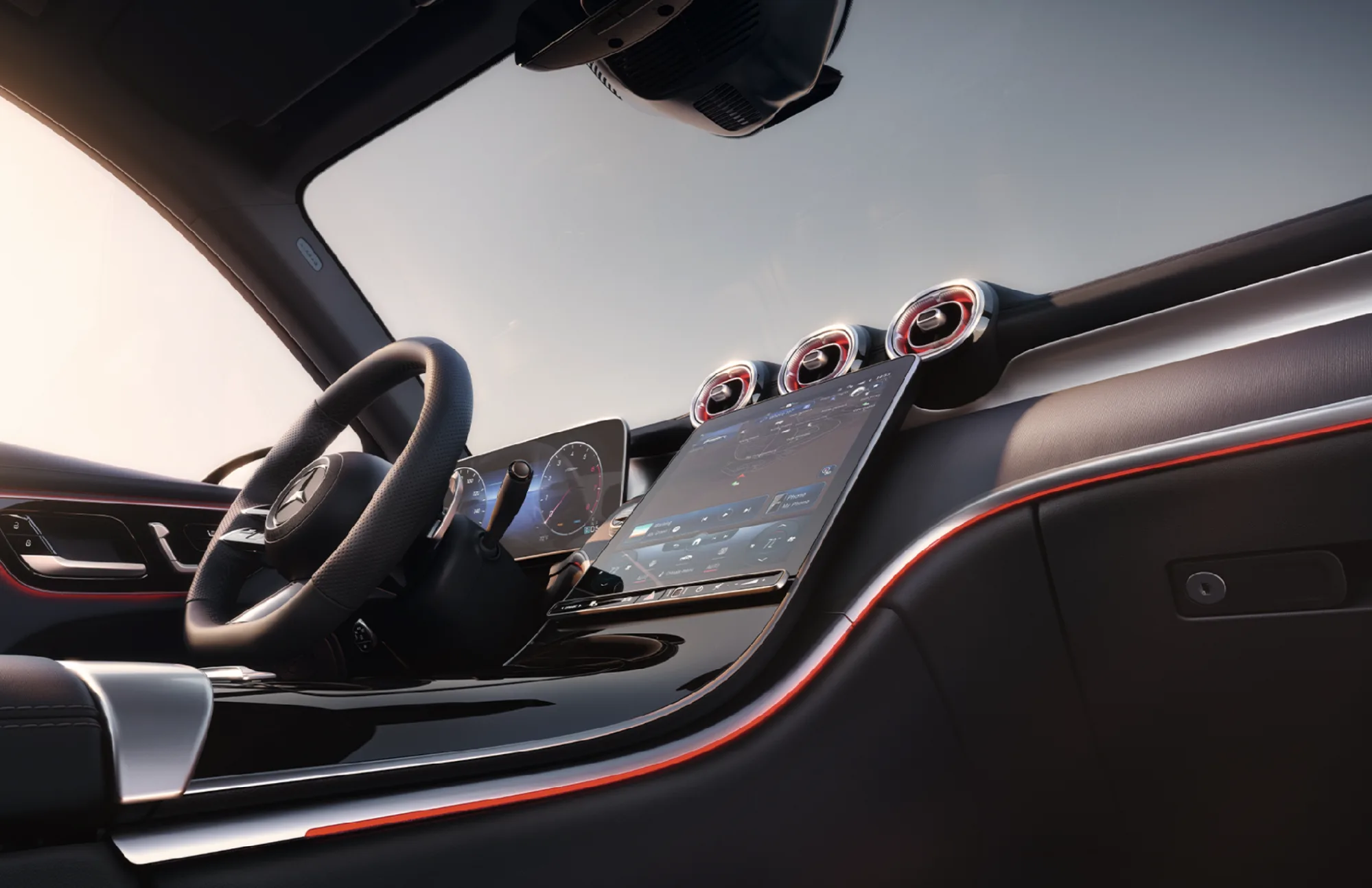 Mercedes-Benz GLC 300 interior showing digital dashboard, center touchscreen, and dashboard vents with red accent trim