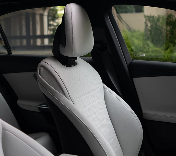 Light grey leather front seat inside a C-Class Sedan
