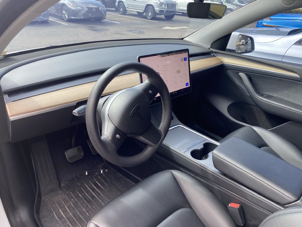 Used 2023 Tesla Model Y Long Range with VIN 7SAYGDEE6PA057504 for sale in Orlando, FL