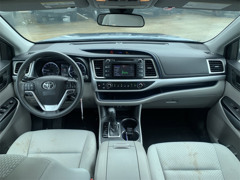 Used 2019 Toyota Highlander LE with VIN 5TDZARFH6KS057163 for sale in Orlando, FL