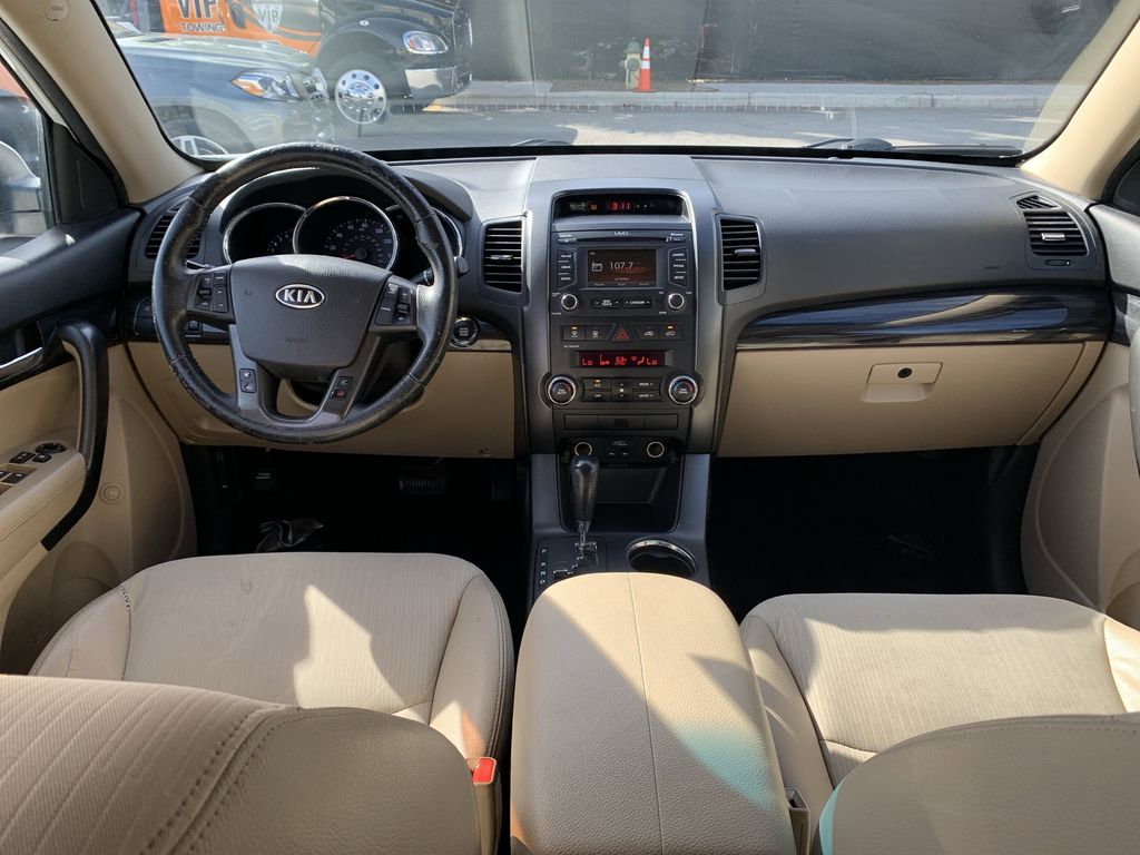 Used 2012 Kia Sorento EX with VIN 5XYKU3A65CG305770 for sale in Orlando, FL