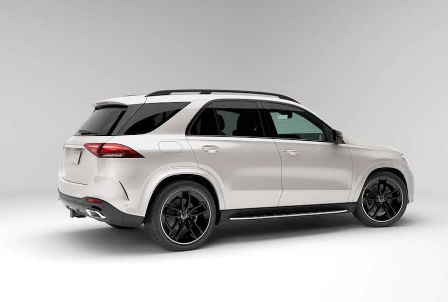 A side view of a white 2026 Mercedes-Benz GLE 450 SUV