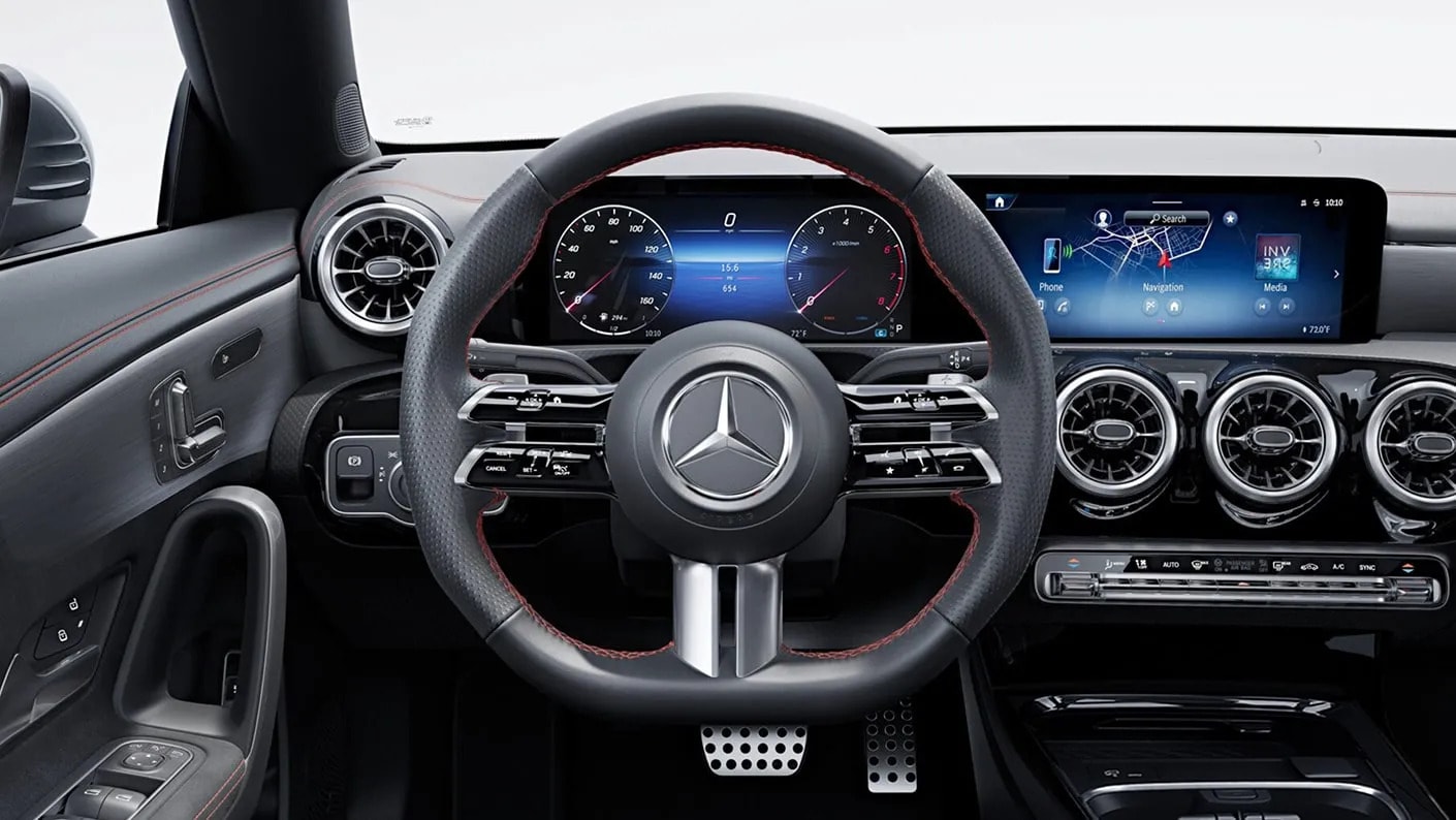 2026 Mercedes-Benz CLE Coupe interior dashboard featuring the 11.9-inch touchscreen and digital instrument cluster