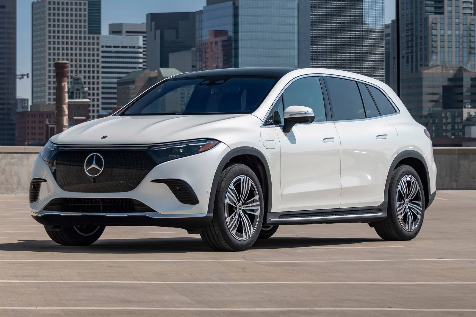 2026 Mercedes-Benz EQS SUV driving on a scenic road