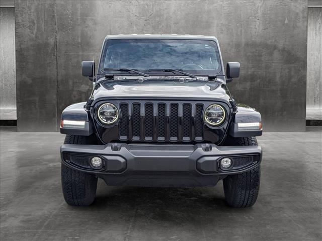 Used 2022 Jeep Wrangler Unlimited Sahara Altitude with VIN 1C4HJXENXNW122947 for sale in Wesley Chapel, FL