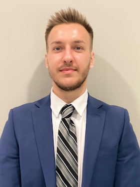 Staff member Hasan Muratovic from ID_0978240c1404