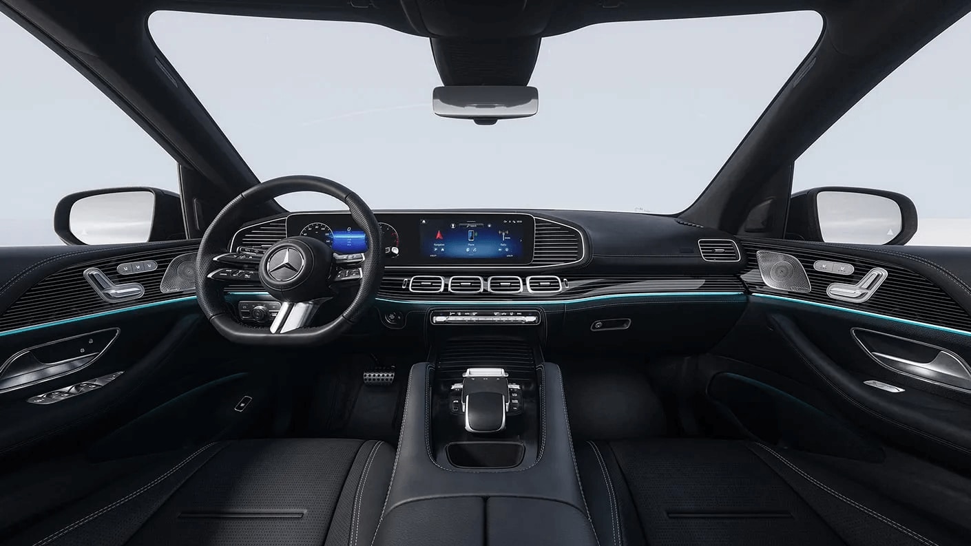 Interior shot of the Mercedes-Benz GLE showing the steering wheel and dashboard interface