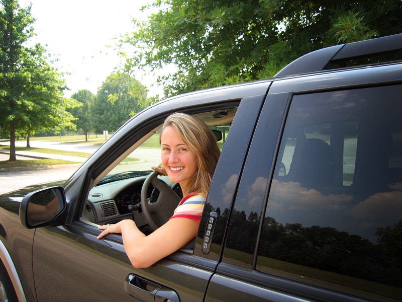 happy mom driving