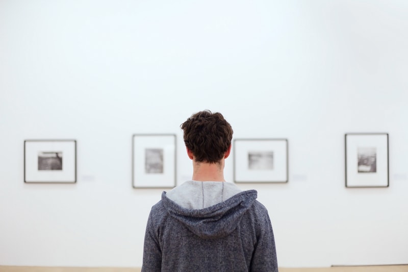 man at art museum