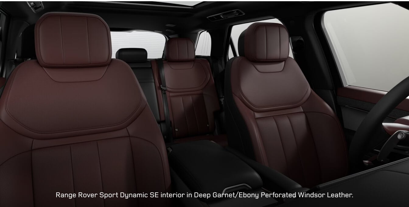 Interior cabin view of a Land Rover Range Rover Sport Dynamic SE highlighting Deep Garnet and Ebony leather seats.