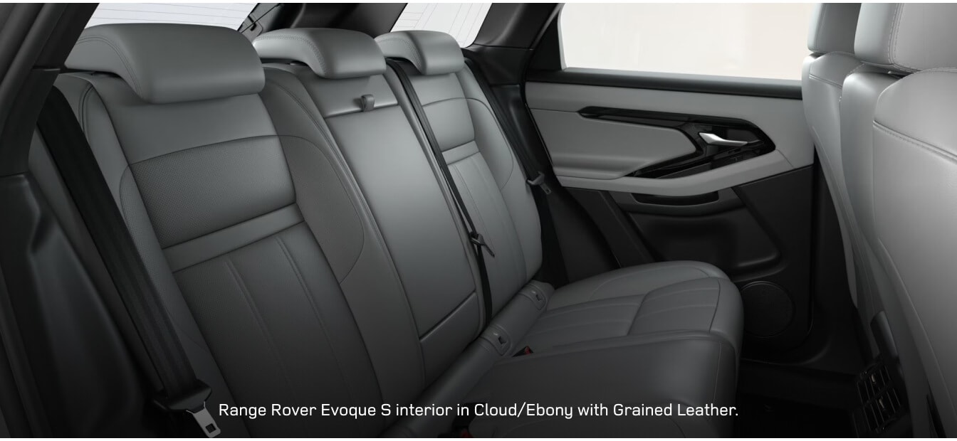 Rear passenger view of a Land Rover Range Rover Evoque S highlighting Cloud and Ebony grained leather seats.