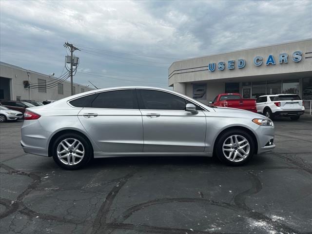 Used 2014 Ford Fusion SE with VIN 3FA6P0HD7ER141433 for sale in Kansas City