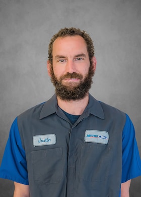 Staff member Justin Caswell from ID_ec36872e5436