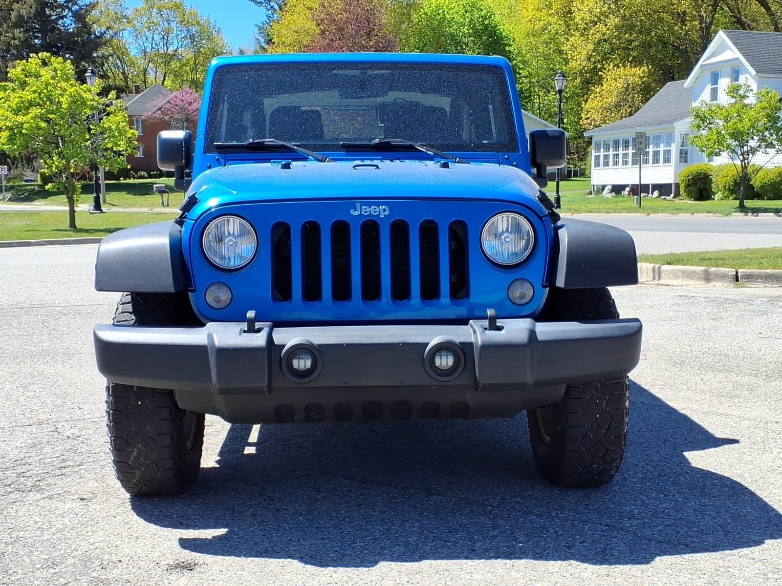 Used 2015 Jeep Wrangler Sport with VIN 1C4AJWAGXFL599609 for sale in New Era, MI