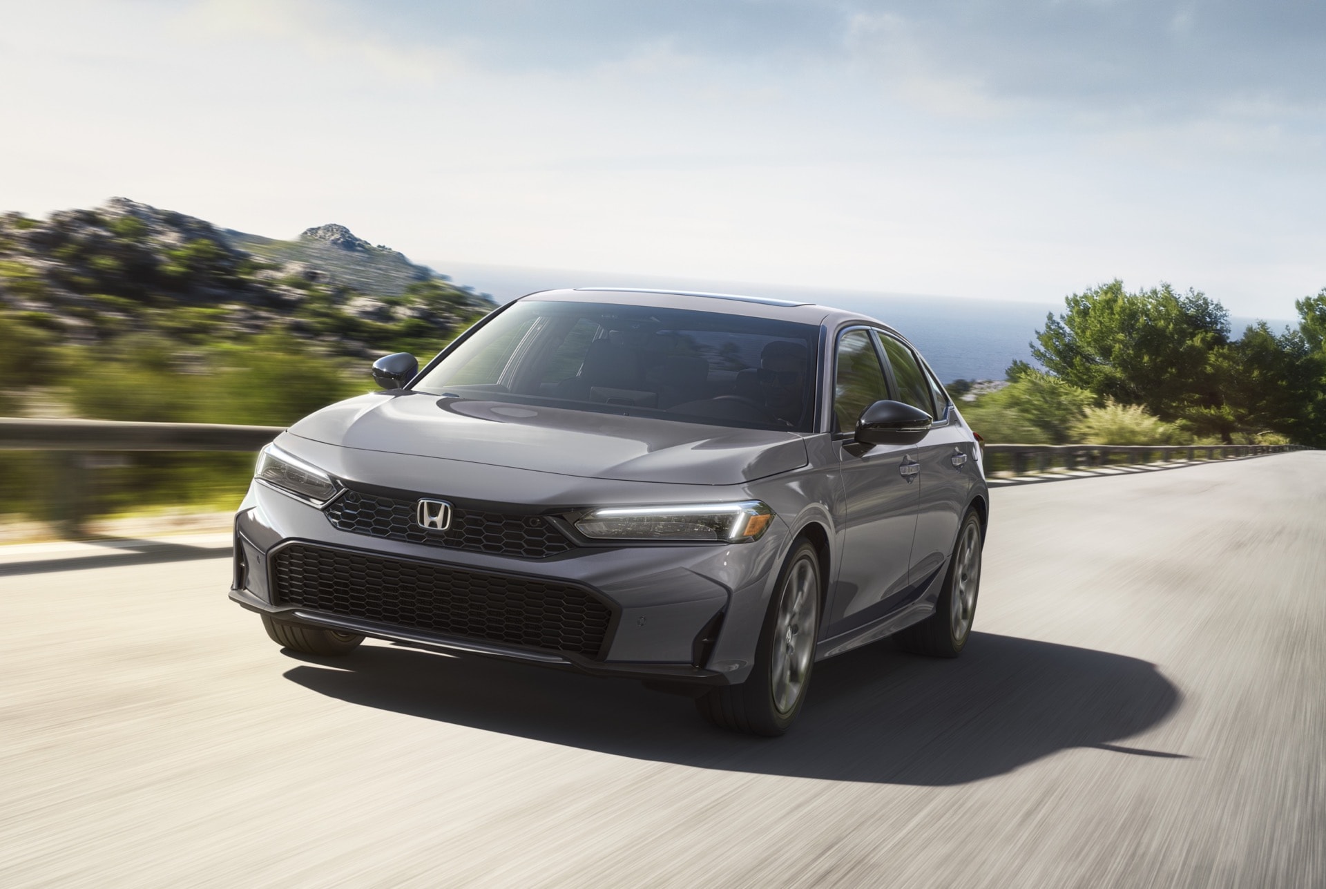 2026%20Honda%20Civic%20Sedan%20Sport%20Touring%20Hybrid.jpg