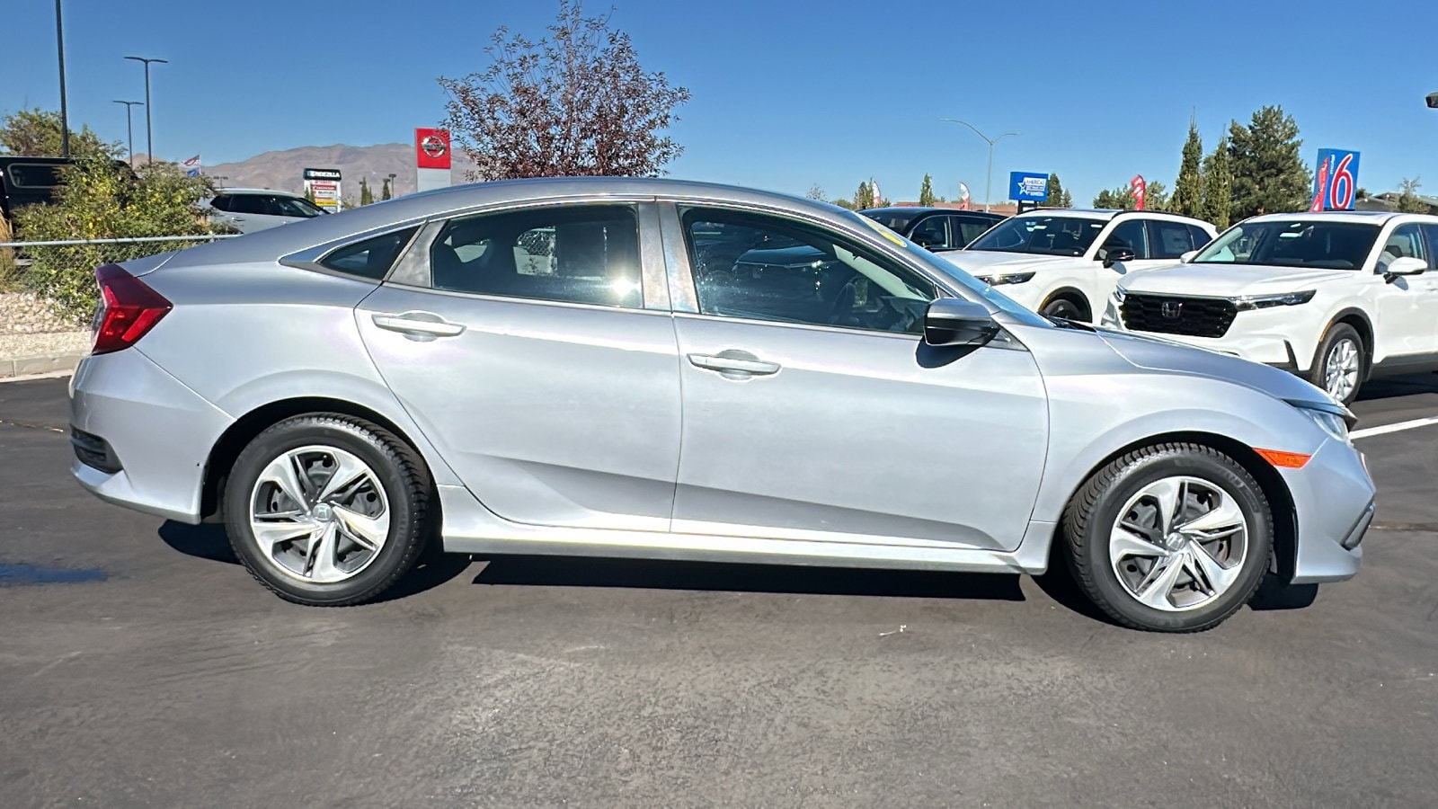 Used 2020 Honda Civic LX with VIN 2HGFC2F60LH579243 for sale in Carson City, NV