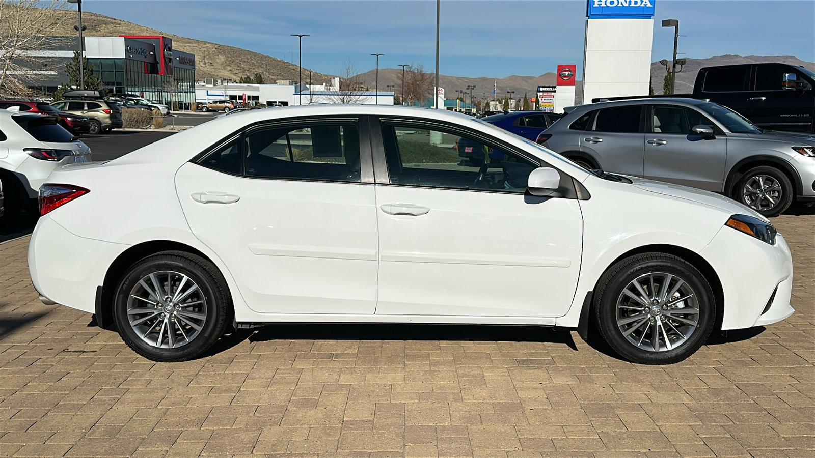 Used 2014 Toyota Corolla L with VIN 5YFBURHE8EP033262 for sale in Carson City, NV