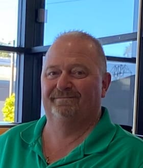 Staff member Ricky Page from ID_9b59fbd75508