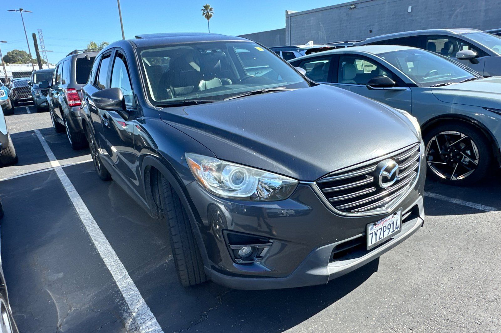 Used 2016 Mazda CX-5 Grand Touring with VIN JM3KE2DY2G0821897 for sale in Richmond, CA