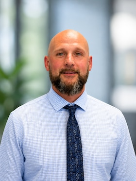 Staff member Charles Logan from ID_6190c9