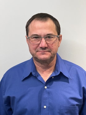 Staff member Mike Blake from ID_4624fd365a94