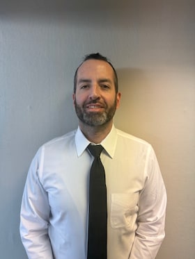 Staff member Anthony Burke from ID_167f4d2bf2d8