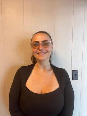 Staff member Julie Kamal from ID_7ff79522899f