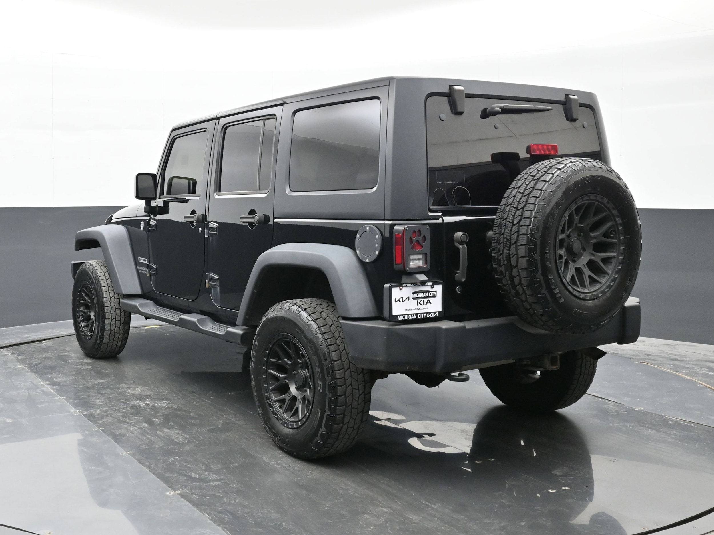 Used 2015 Jeep Wrangler Unlimited Sport with VIN 1C4BJWDG0FL509240 for sale in Michigan City, IN