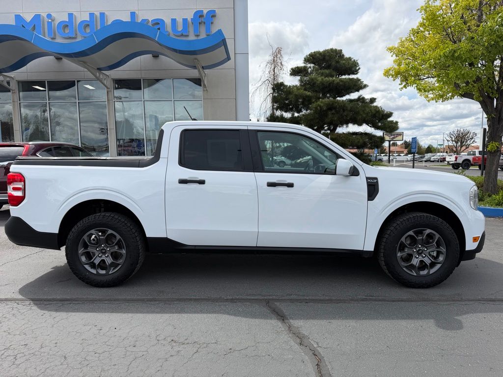 View vehicle photo 2
