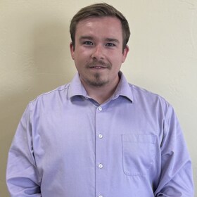 Staff member Devin Mustoe from ID_36694f3256de