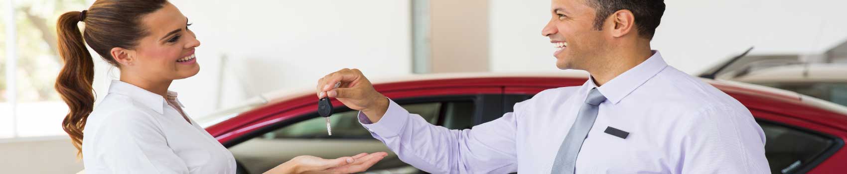 approved-auto-loan-collateral.jpg Happy customer shaking hands after car loan approval in White River Junction Vermont