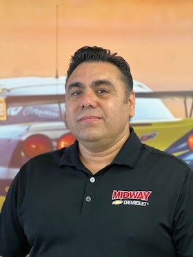 Staff member Luis Aviles from ID_249c0fc6a79c