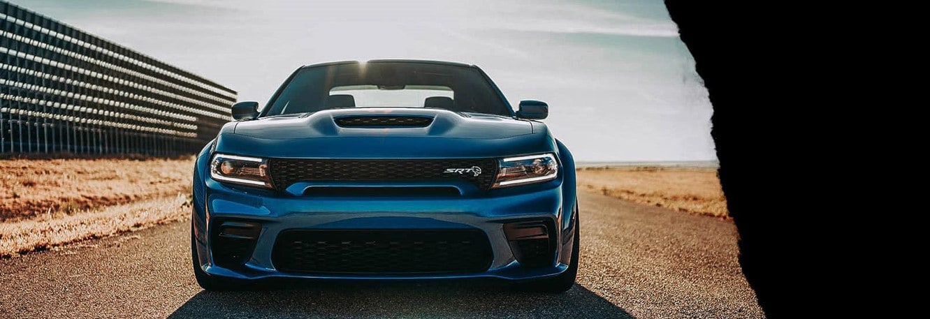 Blue 2022 Dodge Charger driving