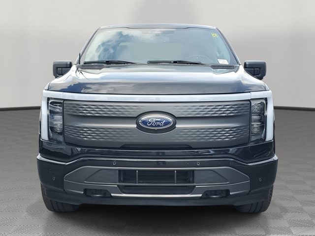 Used 2023 Ford F-150 Lightning XLT with VIN 1FTVW1EL8PWG19563 for sale in Miami, FL