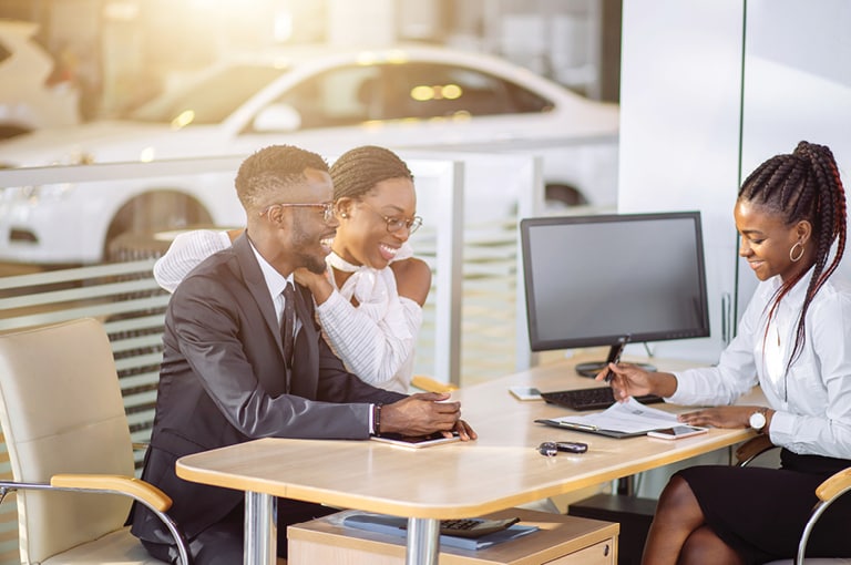Two people at finance desk