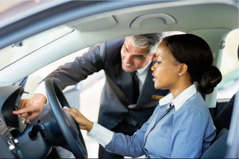 women shopping for used car
