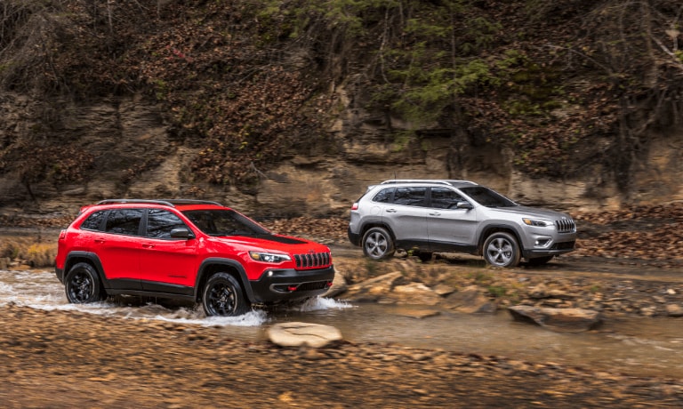 2021 Jeep Cherokee exterior 2 offroad in stream