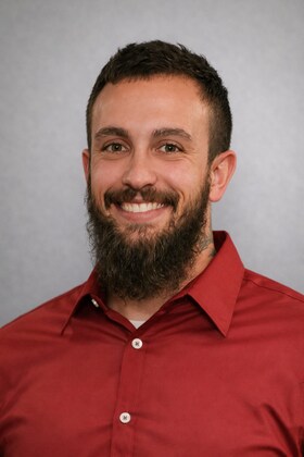 Staff member Aleck Akemon from ID_fa874dfde2d0