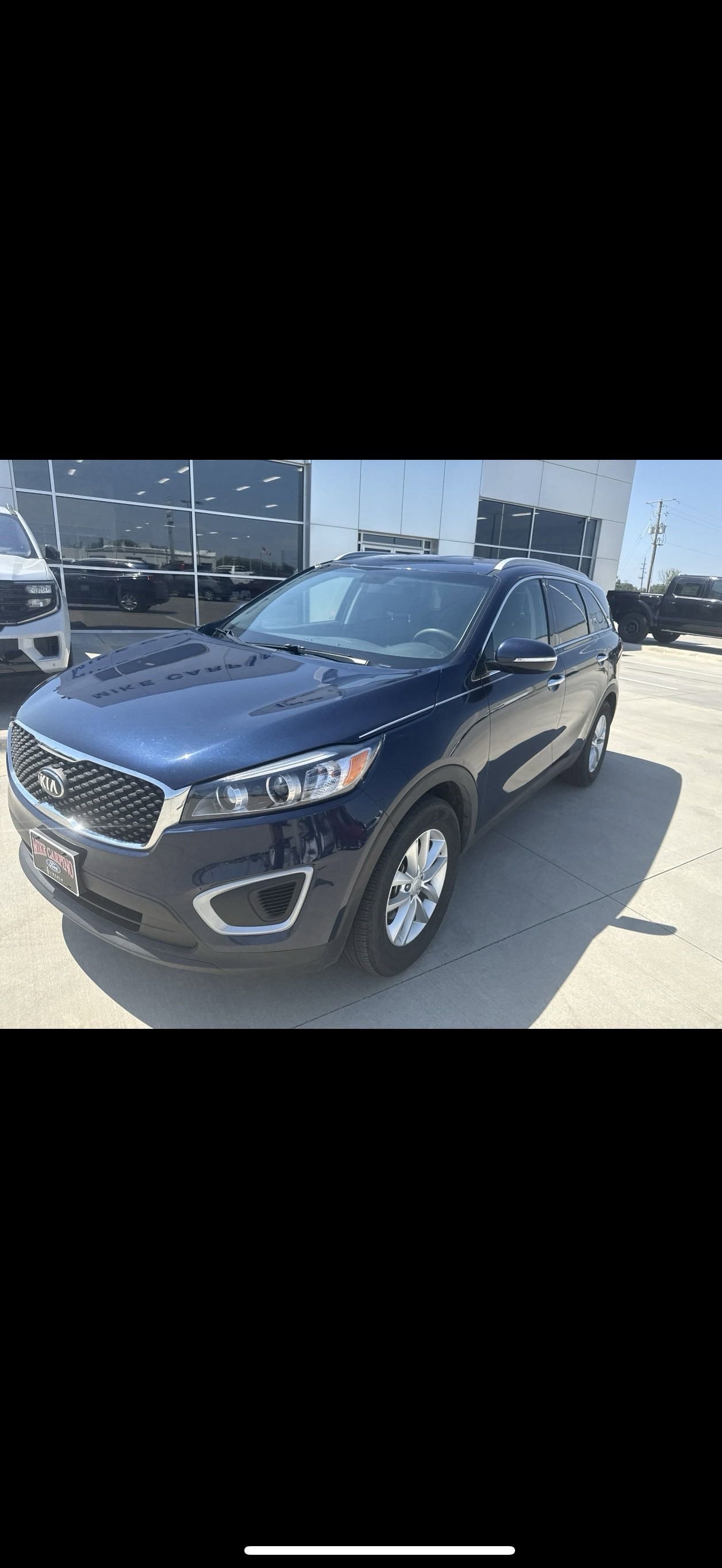 Used 2018 Kia Sorento LX with VIN 5XYPG4A33JG385009 for sale in Parsons, KS